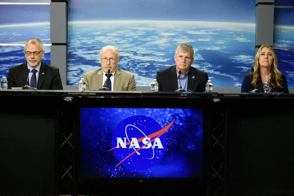 NASA agency officials speak during a news conference to discuss plans to return two astronauts who remained stranded at the International Space Station, on August 24, 2024 | Source: Getty Images