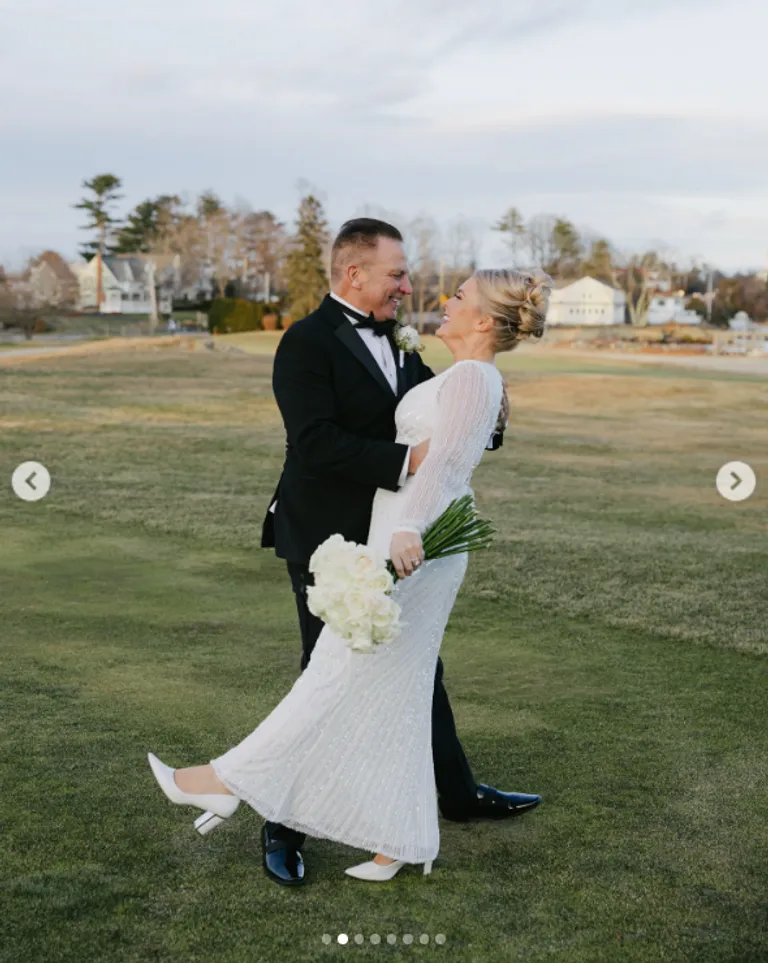 Nicholas Riccio posing with his wife, Karoline Leavitt, during their wedding in Rye, New Hampshire, in a post dated March 17, 2025 | Source: Instagram/karolineleavitt